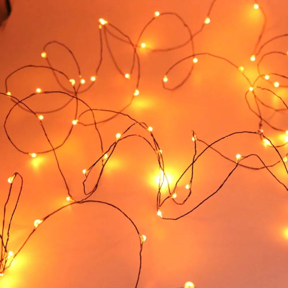 Ghirlanda Luminoasa Decorativa din Cupru Negru 10M cu 100 de LED-uri, Lumina Calda, de Exterior